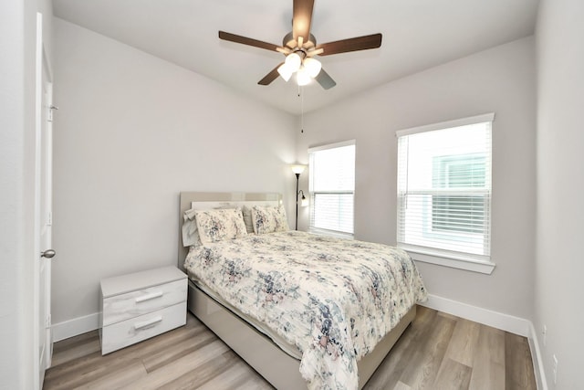 9016 Lonestar River Ln, Houston, TX 77080 - bedroom featuring light wood-style floors and ceiling fan