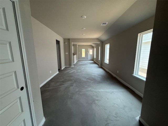2532 Hawks Eye Dr, Conroe, TX 77301 - hallway featuring concrete flooring and lofted ceiling