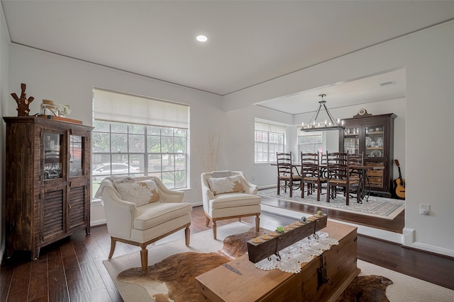 7634 Braesdale Ln, Houston, TX 77071 - living area featuring wood finished floors, recessed lighting, and a chandelier