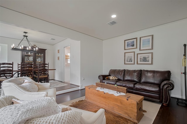 7634 Braesdale Ln, Houston, TX 77071 - living room featuring wood-type flooring, a chandelier, and recessed lighting