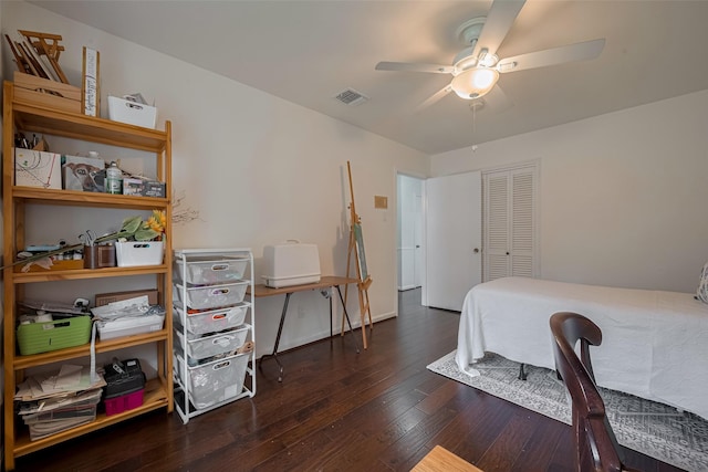 7634 Braesdale Ln, Houston, TX 77071 - bedroom with wood-type flooring, an office area, a closet, and ceiling fan