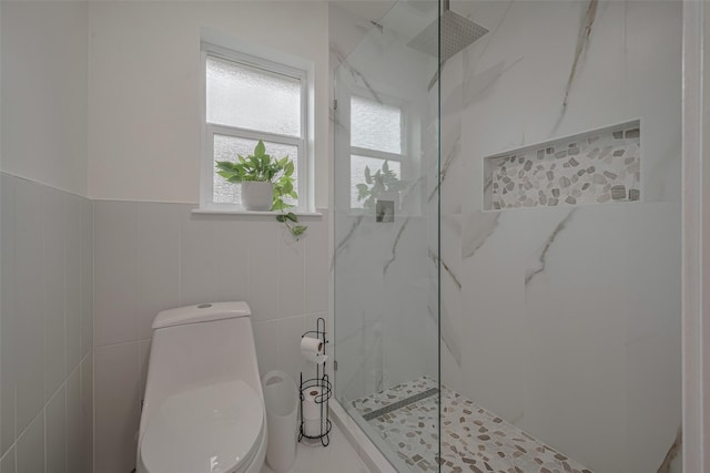 7634 Braesdale Ln, Houston, TX 77071 - bathroom featuring a marble finish shower and tile walls