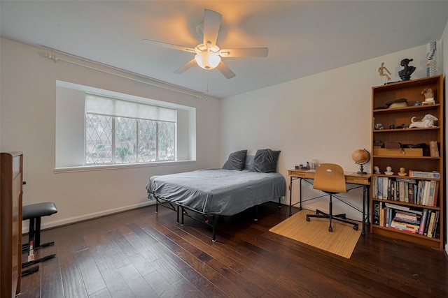 7634 Braesdale Ln, Houston, TX 77071 - bedroom featuring wood-type flooring and a ceiling fan