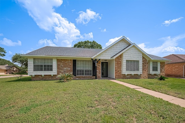 7634 Braesdale Ln, Houston, TX 77071 - single story home featuring a front lawn, brick siding, and a shingled roof