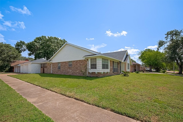 7634 Braesdale Ln, Houston, TX 77071 - view of home's exterior featuring brick siding, an attached garage, a lawn, and driveway