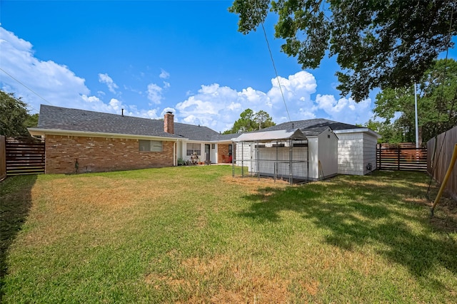 7634 Braesdale Ln, Houston, TX 77071 - fenced backyard featuring a storage shed