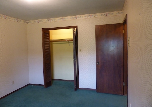 415 N Atchison St, Sealy, TX 77474 - unfurnished bedroom featuring a closet and carpet floors