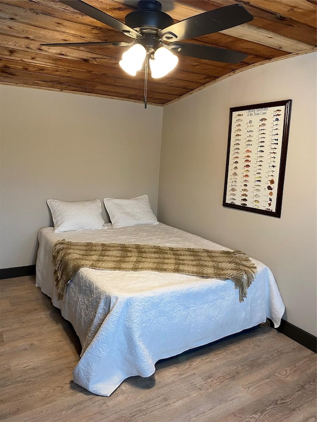TRACT2 Private Road 648th St, Cedar Lake, TX 77414 - bedroom featuring wood ceiling, wood finished floors, and a ceiling fan