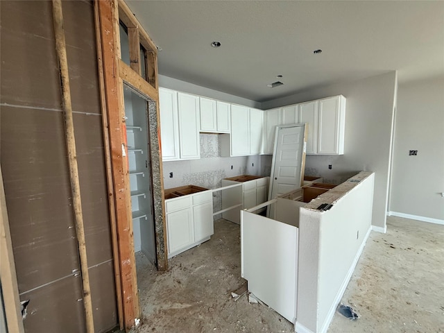 2541 Hawks Eye Dr, Conroe, TX 77301 - kitchen featuring white cabinets