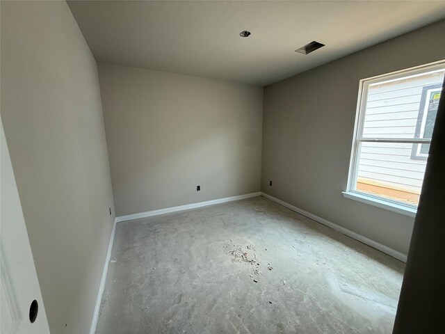 2541 Hawks Eye Dr, Conroe, TX 77301 - empty room with concrete flooring and baseboards