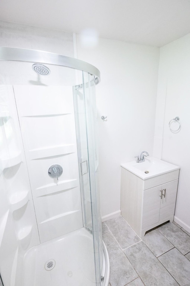 10626 Fussel Rd, Conroe, TX 77385 - bathroom featuring a stall shower, vanity, and tile patterned flooring