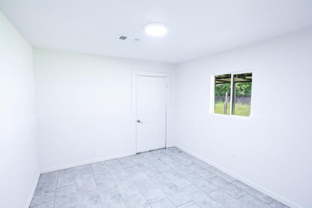 10626 Fussel Rd, Conroe, TX 77385 - spare room with baseboards