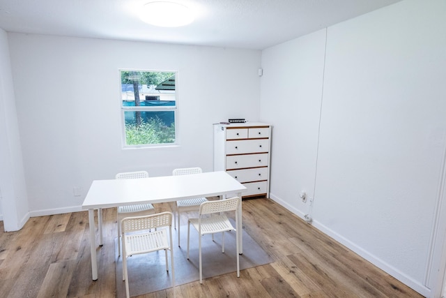 10626 Fussel Rd, Conroe, TX 77385 - home office featuring light wood finished floors and baseboards