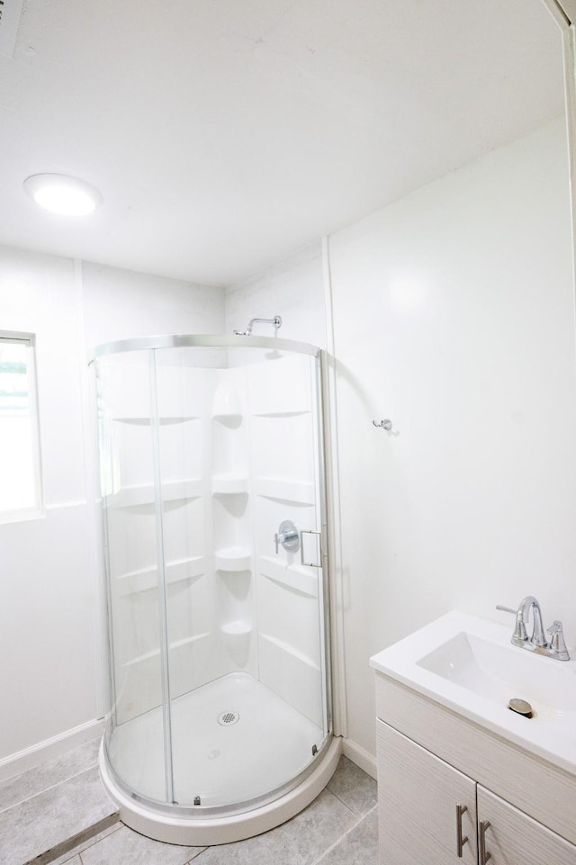 10626 Fussel Rd, Conroe, TX 77385 - bathroom with a shower stall, vanity, and tile patterned flooring