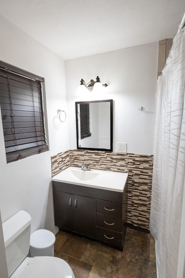 10626 Fussel Rd, Conroe, TX 77385 - full bath featuring vanity and stone finish flooring