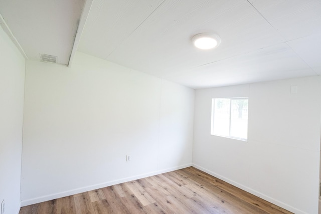 10626 Fussel Rd, Conroe, TX 77385 - empty room featuring light wood-style floors and baseboards