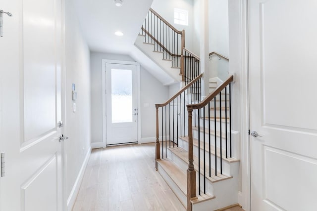 819 Bringhurst, Houston, TX 77020 - entryway with wood finished floors, stairway, and recessed lighting