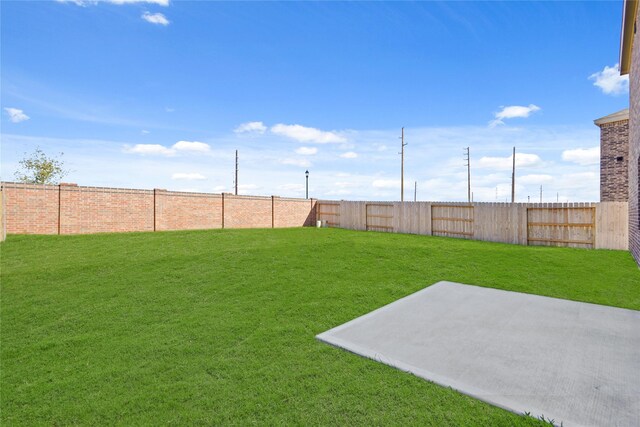 27214 Leeward Jetty Dr, Katy, TX 77493 - fenced backyard featuring a patio area