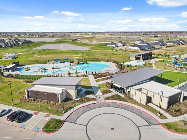 27214 Leeward Jetty Dr, Katy, TX 77493 - aerial perspective of suburban area with a pool and a large body of water