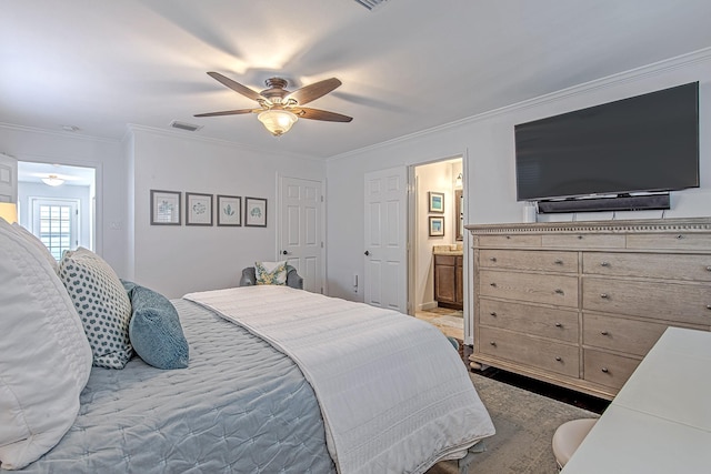520 W 30th St, Houston, TX 77018 - bedroom with crown molding, ceiling fan, and connected bathroom