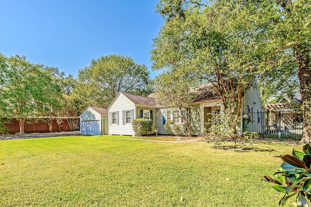 520 W 30th St, Houston, TX 77018 - rear view of property featuring a storage shed and a detached garage