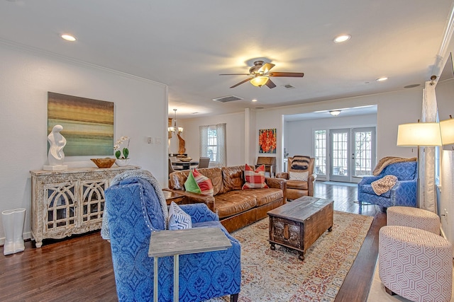 520 W 30th St, Houston, TX 77018 - living area featuring wood finished floors, ornamental molding, healthy amount of natural light, a chandelier, and recessed lighting