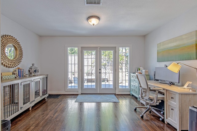 520 W 30th St, Houston, TX 77018 - home office featuring healthy amount of natural light, french doors, dark wood-style flooring, and a textured ceiling