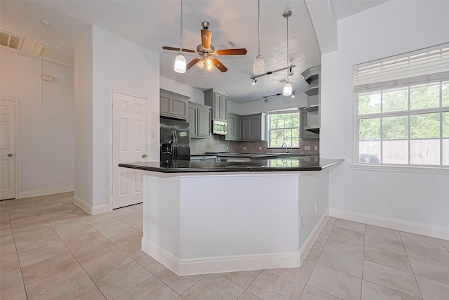 2403 Ranna Ct, Sugar Land, TX 77498 - kitchen with refrigerator with ice dispenser, gray cabinets, light tile patterned floors, and dark countertops