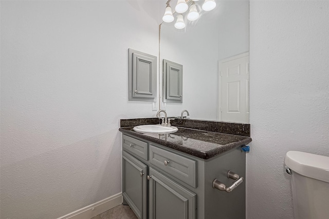 2403 Ranna Ct, Sugar Land, TX 77498 - bathroom featuring vanity and a chandelier