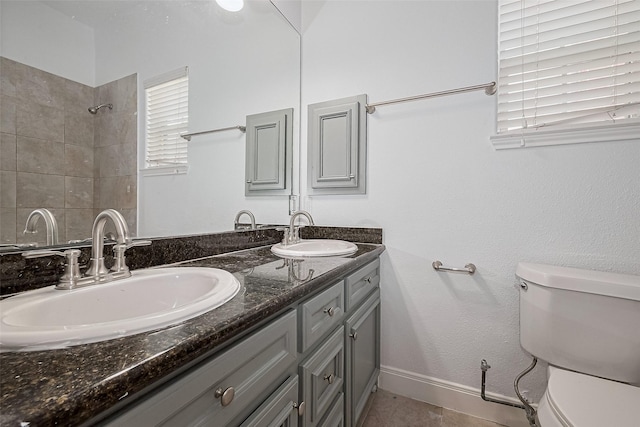 2403 Ranna Ct, Sugar Land, TX 77498 - bathroom featuring double vanity and tiled shower