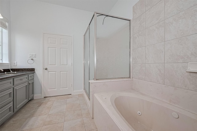 2403 Ranna Ct, Sugar Land, TX 77498 - full bathroom featuring a jetted tub, vanity, tile patterned floors, and a shower stall