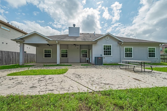 2403 Ranna Ct, Sugar Land, TX 77498 - rear view of property with a ceiling fan, a patio area, and a chimney