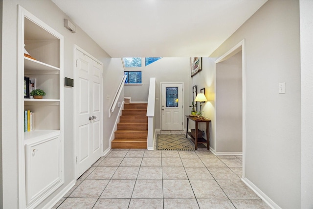 11 Leaf Trace Ct, Spring, TX 77381 - entryway with light tile patterned floors and stairs