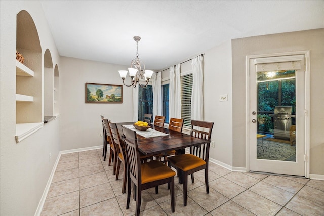 11 Leaf Trace Ct, Spring, TX 77381 - dining space featuring a chandelier and light tile patterned floors