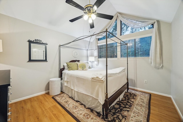 11 Leaf Trace Ct, Spring, TX 77381 - bedroom with lofted ceiling, wood finished floors, and a ceiling fan