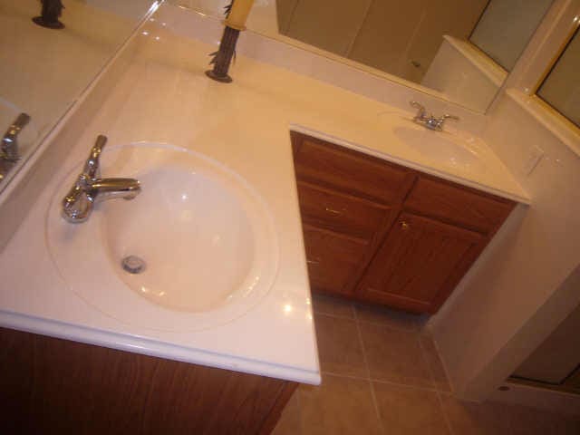 11514 Musetta Ct, Cypress, TX 77429 - bathroom featuring double vanity and tile patterned floors