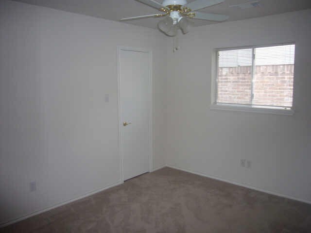 11514 Musetta Ct, Cypress, TX 77429 - carpeted empty room featuring ceiling fan