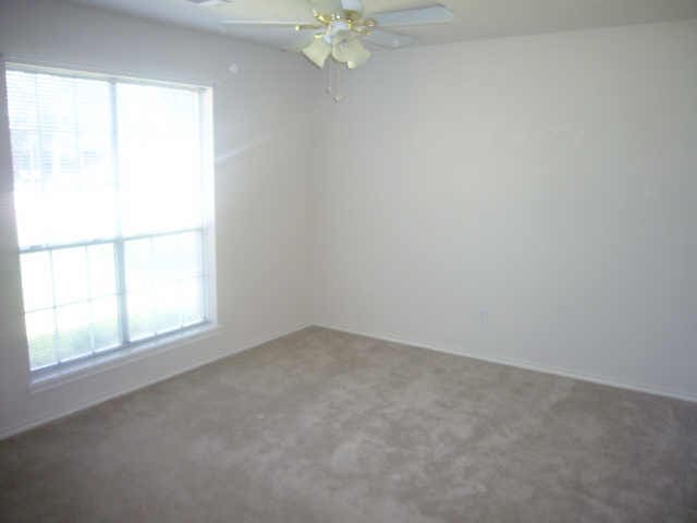 11514 Musetta Ct, Cypress, TX 77429 - unfurnished room with ceiling fan and carpet flooring