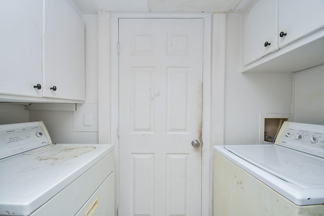 2635 Marilee Ln Unit 2635, Houston, TX 77057 - laundry area featuring washing machine and dryer and cabinet space