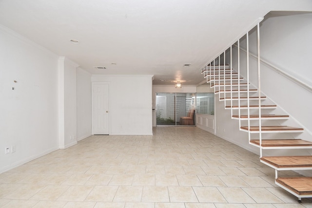 2635 Marilee Ln Unit 2635, Houston, TX 77057 - unfurnished living room with ornamental molding and stairway