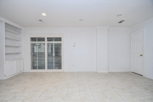 2635 Marilee Ln Unit 2635, Houston, TX 77057 - unfurnished room featuring crown molding, built in shelves, and recessed lighting