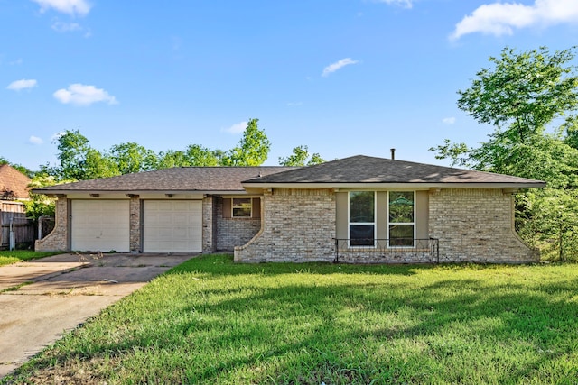 6611 Mohawk St, Houston, TX 77016 - view of front facade with driveway, a garage, and brick siding