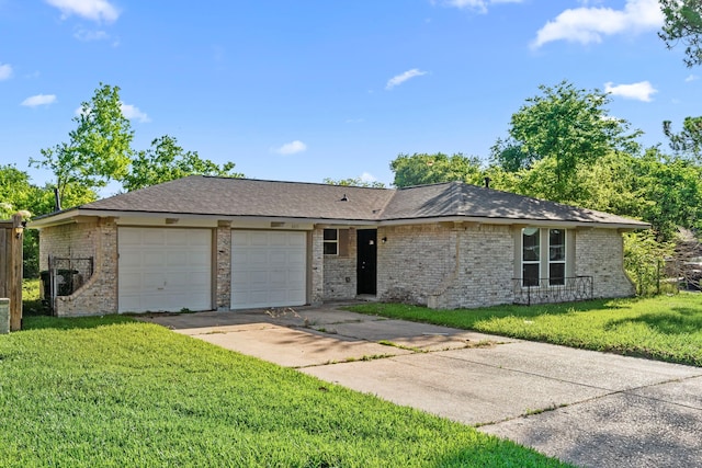6611 Mohawk St, Houston, TX 77016 - ranch-style home with an attached garage, a front lawn, driveway, and brick siding