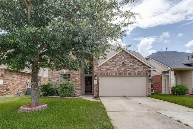 23606 Stargazer Pt, Spring, TX 77373 - view of front of house with brick siding, an attached garage, driveway, and a front lawn