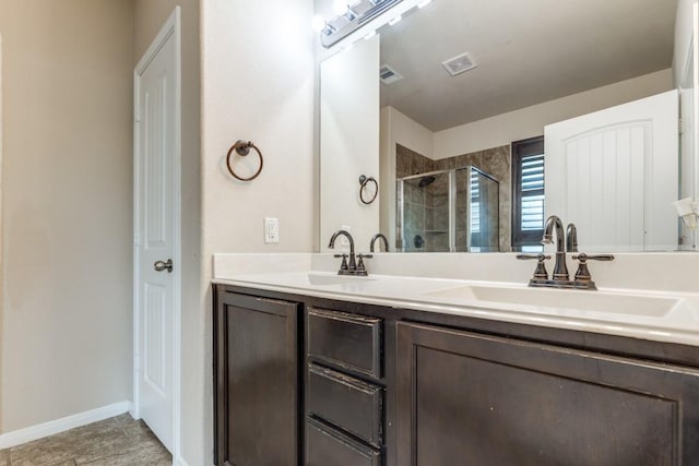 23606 Stargazer Pt, Spring, TX 77373 - bathroom featuring a stall shower and double vanity