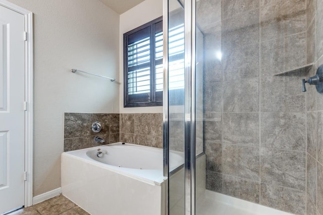 23606 Stargazer Pt, Spring, TX 77373 - full bath with a garden tub, a shower stall, and tile patterned flooring