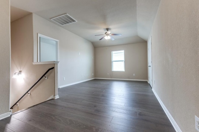 23606 Stargazer Pt, Spring, TX 77373 - empty room featuring a ceiling fan, dark wood-style floors, and vaulted ceiling
