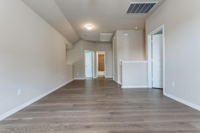 23606 Stargazer Pt, Spring, TX 77373 - empty room with wood finished floors and attic access
