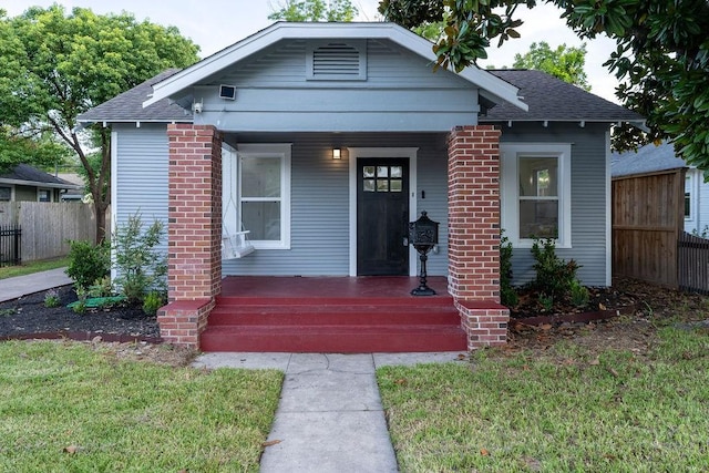 1020 E 16th St, Houston, TX 77009 - bungalow with a porch and a shingled roof