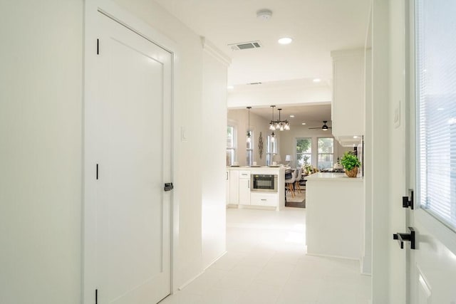 1020 E 16th St, Houston, TX 77009 - hall featuring recessed lighting and a chandelier